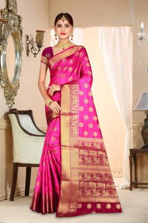 Bright And Visually Appealing Color Is Here With This Art Silk Based Saree In Rani Pink Color Paired With Contrasting Wine Colored Blouse. This Rich Saree Will Give An Attractive Look To Your Personality.