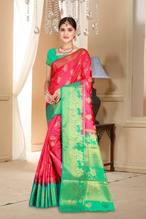 Shine Bright Wearing This Beautiful Saree In Rani Pink Color Paired With Contrasting Sea Green Colored Blouse. This Saree And Blouse Are Fabricated On Art Silk. 