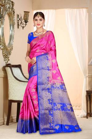 Look Pretty Attractive Wearing This Beautiful Pink Colored Saree Paired With Contrasting Royal Blue Colored Blouse. This Saree And Blouse Are Fabricated On Art Silk Beautified With Weave.