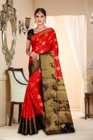 Adorn The Pretty Angelic Look Wearing This Art Silk Based Saree In Red Color Paired With Black Colored Blouse. This Saree Is Light Weight , Durable And Easy To Care For.