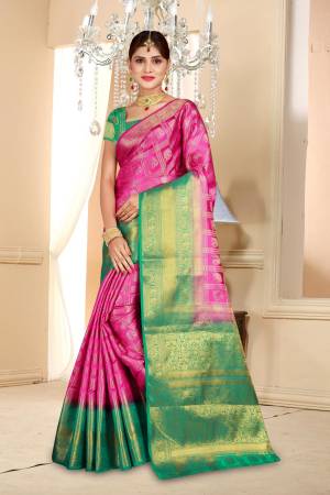 Shine Bright Wearing This Beautiful Saree In Rani Pink Color Paired With Contrasting  Green Colored Blouse. This Saree And Blouse Are Fabricated On Art Silk. 