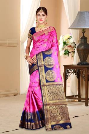 Shine Bright Wearing This Beautiful Saree In Fuschia Pink Color Paired With Contrasting Navy Blue Colored Blouse. This Saree And Blouse Are Fabricated On Art Silk. 