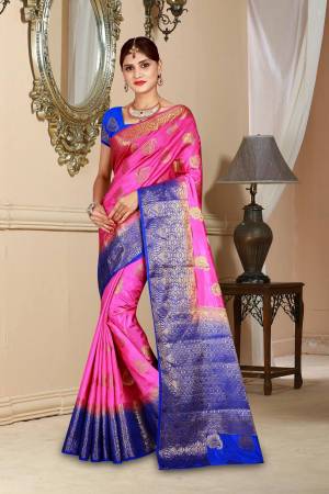 Look Pretty Wearing This Lovely Pink Colored Saree Paired With Contrasting Royal Blue Colored Blouse. This Saree And Blouse Are Fabricated On Art Silk Beautified with Weave All Over. Buy This Saree Now.