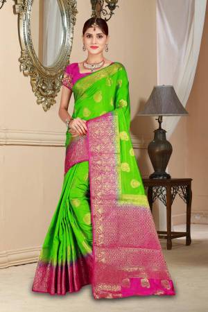 Catch All The Limelight Wearing This Pretty Attractive Parrot Green Colored Saree Paired With Contrasting Rani Pink Colored Blouse. This Saree And Blouse Are Art Silk Based Beautified With Weave All Over It. 