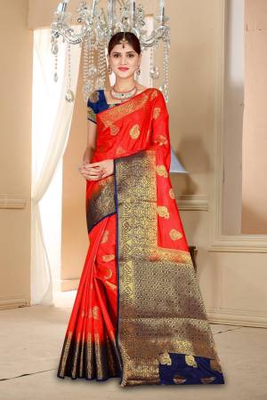 Adorn the Pretty Angelic Look Wearing This Attractive Saree In Red Color Paired With Contrasting Navy Blue Colored Blouse. This Saree And Blouse Are Art Silk Based Beautified With Weave. This Saree Will Give A Rich Look To Your Personality Like Never Before.