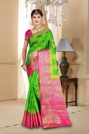 Catch All The Limelight Wearing This Pretty Attractive Parrot Green Colored Saree Paired With Contrasting Dark Pink Colored Blouse. This Saree And Blouse Are Art Silk Based Beautified With Weave All Over It. 