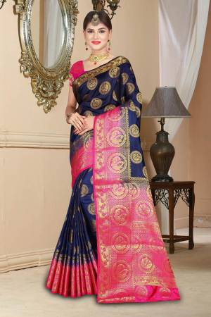 Enhance Your Personality Wearing This Art Silk Based Saree In Navy Blue Color Paired With Contrasting Pink Colored Blouse. This Saree And Blouse Are Light Weight And Durable Which Is Easy To Care For.