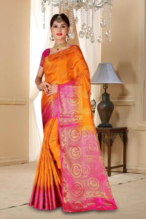 Celebrate This Festive Season Wearing This Bright And Attractive Art Silk Based Saree In Orange Color Paired With Contrasting Dark Pink Colored Blouse. This Saree And Blouse Are Beautified With Weave All Over.