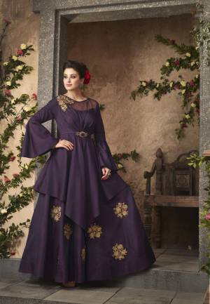 Grab This Beautiful Designer Floor Length Readymade Gown In Purple Color Fabricated On Satin Silk Beautified With Jari Embroidery And Stone Work. It Is Beautified With Embroidered Patch And Stone Work.