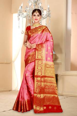 Look Pretty In This Pink Colored Saree Paired With Red Colored Blouse. This Saree and Blouse Are Fabricated On Art Silk Beautified With Weave All Over. Buy Now.