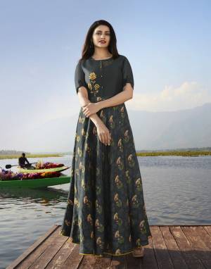 Enhance Your Personality Wearing This Designer Long Kurti In Dark Grey Color Fabricated On Satin Georgette Beautified With Prints And Embroidery. It Is Available In All Regular Sizes. Buy Now.