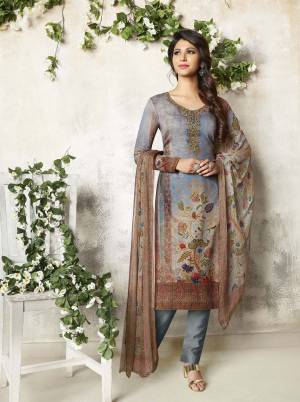 Enhance Your Personality Wearing this Designer Semi-Stitched Suit In Grey Color Paired With Grey And Multi Colored Dupatta. Its Top Is Fabricated On Soft Cotton Paired With Cotton Bottom And Chiffon Dupatta. It Is Beautified With Prints And Resham Embroidery And Stone Work. 