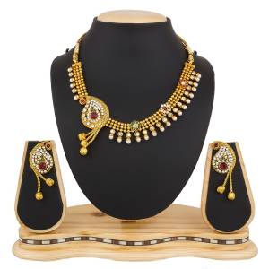 Rich And Elegant Looking Necklace Set Is Here In Golden Color Beautified With Stone And Moti Work. This Can Also Be Paired With Any Colored Ethnic Attire. Buy Now.