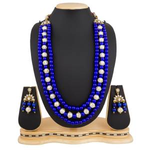 Be It A Simple Kurti Or Suit OR A Saree, This Necklace Set Is Suitable For All.Grab This Necklace Set In Royal Blue Color Beautified With Moti And Stone Work. Buy Now.