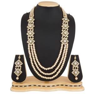 You Will Definitely Earn Lots Of Compliments With This Rich and Elegant Looking Necklace Set That Can Br Paired With Any Colored Ethnic Attire. This Necklace Set Is Light Weight And Easy To Carry All Day Long. Buy Now.