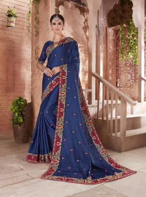 Enance Your Personality Wearing This Designer Saree In Blue Color Paired With Blue Colored Blouse. This Saree And Blouse are Art Silk Based Beautified With Jari And Thread Embroidery With Stone Work. Buy Now.
