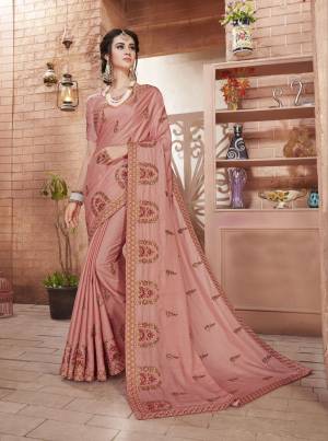 Look The Most Prettiest Of All Wearing This Designer Saree In Dusty Pink Color Paired With Dusty Pink Colored Blouse. This Saree And Blouse Are Art Silk Based Beautified With  contrasting Thread And Jari work. Buy This Designer Saree Now.