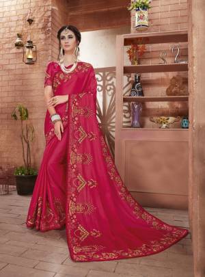 Bright And Visually Appealing Color Is Here With This Designer Saree In Dark Pink Color Paired With Dark Pink Colored Blouse. This Saree And Blouse Are Fabricated On Art Silk Beautified With Heavy Embroidery. 