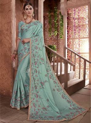 Here Is A Very Pretty Looking Saree In Aqua Blue Color Paired With Aqua Blue Colored Blouse. This Saree And Blouse are Fabricated On Art Silk Beautified With Jari And Thread Work. Buy Now.