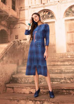 Grab This Pretty Readymade Kurti In Blue Color Fabricated On Cotton Beautified With Prints And Thread Work. This Kurti Ensures Superb Comfort all Day Long. Buy Now.