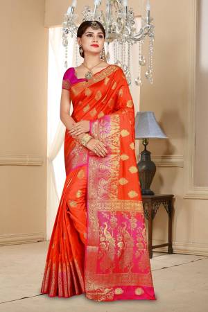 Bright And Visually Appealing Color Is Here In Orange Colored Saree Paired With Contrasting Rani Pink Colored Blouse. This Saree And Blouse Are Fabricated On Art Silk beautified With Weave. 