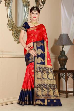 Adorn The Pretty Angelic Look Wearing This Silk Based Saree In Red Color Paired With Navy Blue Colored Blouse. This Saree And Blouse are Fabricated On Art Silk Beautified Weave. It Will Give A Rich Look To Your Personality. 