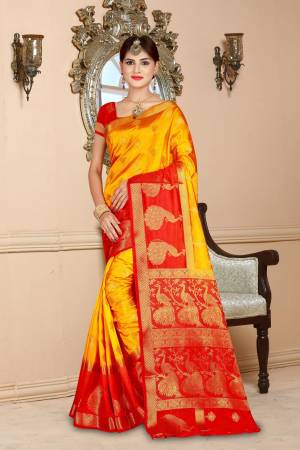 Celebrate This Festive Season Wearing This Attractive Looking Saree In Musturd Yellow Color Paired With Contrasting Red Colored Blouse. This Saree And Blouse are Art Silk Based Beautified With Weave.