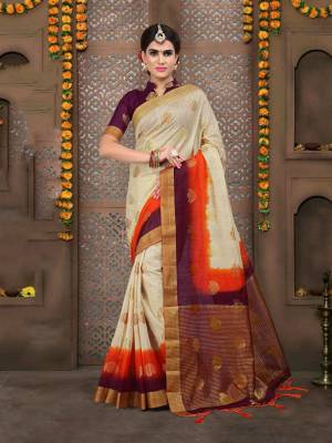 Simple And Elegant Looking Saree Is Here In White Color Paired With Wine Colored Blouse. This Saree And Blouse Are Linen Based Beautified With Weave All Over.