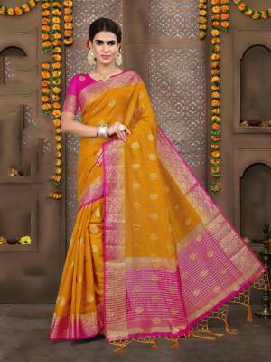 This Festive Season, Grab This Beautiful Musturd Yellow Colored Saree Paired With Contrasting Pink Colored Blouse. This Saree And Blouse are Fabricated On Linen It Is Durable and Easy To Care For.