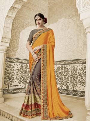 Flaunt a new ethnic look wearing this orange and grey color two tone silk fabrics and two tone silk satin saree. Ideal for party, festive & social gatherings. this gorgeous saree featuring a beautiful mix of designs. Its attractive color and heavy designer embroidered saree, moti design, also heavy designer blouse, cut paste design saree, beautiful floral design all over work over the attire & contrast hemline adds to the look. Comes along with a contrast unstitched blouse.