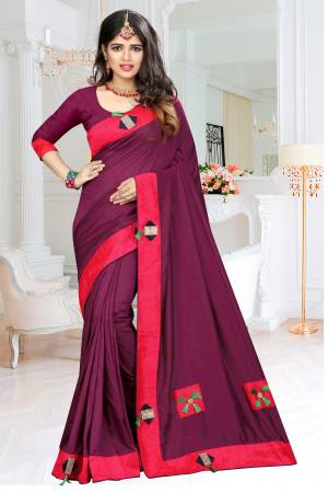 Add This Beautiful And Attractive Shade To Your Wardrobe With This Designer Saree In Wine Color Paired With Wine Colored Blouse. This Saree And Blouse are Fabricated On Soft Silk Which Gives A rich Look And Also It Is Comfortable To Carry Throughout The Gala.