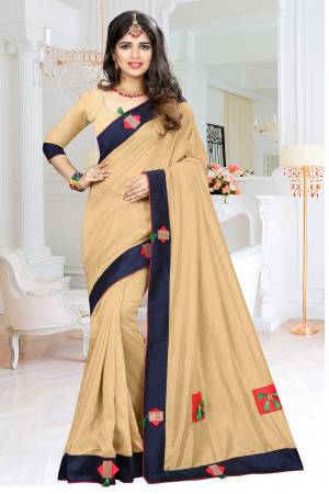 Falunt Your Rich And Elegant Taste Wearing This Designer Saree In Beige Color Paired With Beige Colored Blouse. This Saree And Blouse Fabricated On Soft Silk Which Ensures Superb Comfort Throughout The Gala. 