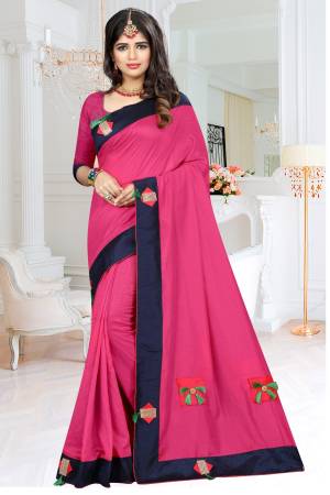 Shine Bright In This Lovely Magenta Pink Colored Saree paired With Magenta Pink Colored Blouse. This Saree And Blouse Are Fabricated On Soft Silk beautified With Patches With Buttons And Tassels. 