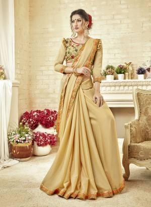 Flaunt Your Rich And elegant Taste Draping This Beautiful Designer Saree In Beige Color Paired With Beige Colored Blouse. This Saree Is Fabricated On Chiffon Paired With Art Silk Fabricated Blouse. Buy This Designer Saree Now. 