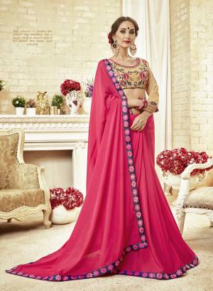 Shine Bright Wearing This Designer Saree In Dark Pink Color Paired With Contrasting Beige Colored Blouse. This Saree Is Fabricated On Silk Georgette Paired With Art Silk Fabricated Blouse. It Is Beautified with  Contrasting Thread Work Over The Blouse. 
