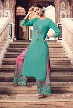 Very Pretty Shade Is Here With This Readymade Plazzo Set In Turquoise Blue Colored Kurti Paired With Pink And Blue Plazzo. Its Top IS Fabricated On Muslin Silk Paired With Modal Satin Bottom. Buy Now.