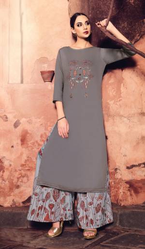 Flaunt Your Rich And Elegant Taste Wearing This Designer Readymade Kurti With Plazzo In Grey Colored Top Paired With Light Grey Colored Bottom. Its Top IS Muslin Silk Fabricated Paired With Modal Satin Bottom. Buy This Pair Now.