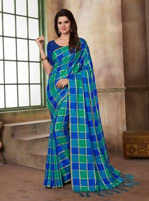 Grab This Pretty Checks Printed Silk Based Saree In Blue Color Paired With Royal Blue Colored Blouse. This Saree And Blouse Are Fabricated On Art Silk In Two Tone.