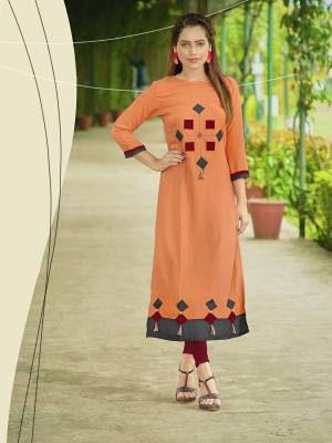 Grab This Pretty Elegant Looking Kurti For Your Semi-Casual Wear In Peach Color Fabricated On Rayon. This Kurti Is Beautified with Buttons And Tassels And Available In All Regular Sizes.