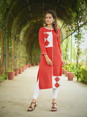 For Your Casual Or Semi-Casual Wear, Grab This Pretty Kurti In Dark Peach Color Fabricated On Rayon. It Has Multi Color Patch Work And Buttons.