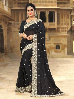 For A Bold and Beautiful Look, Grab This Heavy Designer Saree In Black Color Paired With Black Colored Blouse. This Saree And Blouse Are Georgette Based Beautified with Heavy Embroidery.
