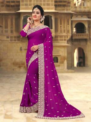Attract All Wearing This Designer Saree In Purple Color Paired With Purple Colored Blouse. This Saree And Blouse Are Fabricated On Georgette Beautified With Heavy Embroidered Lace Border. Buy This Saree Now.