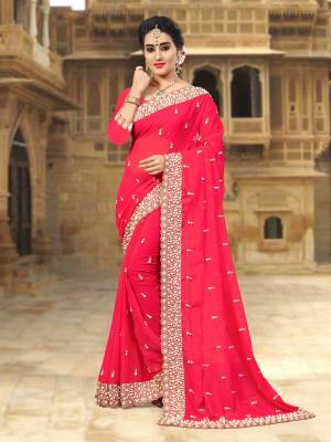 Lovely Shade In Red Is Here With This Designer Saree In Crimson Red Color Paired With Crimson Red Colored Blouse. This Saree And Blouse Are Georgette Based Beautified With Heavy Embroidered Lace Border.