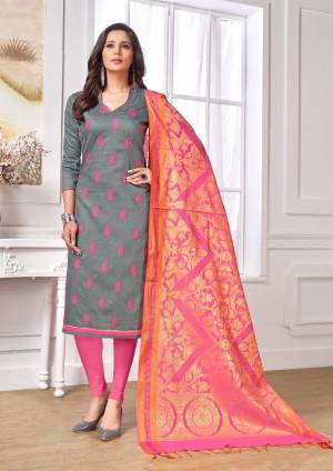 A Very Pretty And Rich Combination Is Here With This Designer Dress Material In Grey Colored Top Paired With Contrasting Pink Colored Bottom And Dupatta. Its Top And Bottom Are Cotton Based Paired With Banarasi Art Silk Dupatta. Buy Now.