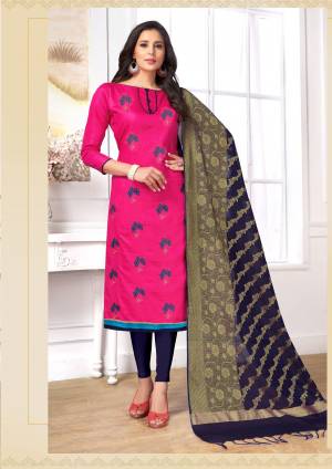 Shine Bright Wearing This Straight Suit In Dark Pink Colored Top Paired With Contrasting Navy Blue Colored Bottom And Dupatta. Its Top And Bottom Are Cotton Based Paired With Banarasi Art Silk Dupatta. This Dress Material Is Light Weight And Easy To Carry All Day Long.