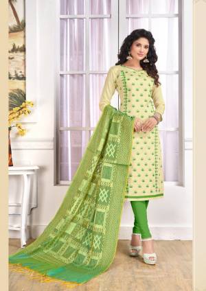 Celebrate This Festive With Ease And Comfort Wearing This Suit In Cream Colored Top Paired With Contrasting Green Colored Bottom and Dupatta. Its Top And Bottom Are Banarasi Art Silk Dupatta. It Is Beautified With Thread Work. Buy Now.