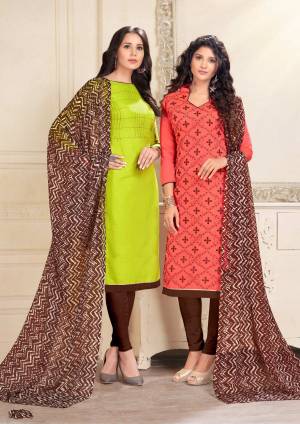 This Festive Season, Grab Two Dresses In Price Of One, Grab This Dress Material With Two Tops One In Parrot Green And Another In Dark Peach Color Paired With Brown Colored Bottom And Dupatta. Green Is Cotton Based And Peach Is Chanderi Fabricated Paired With Cotton Bottom And Chiffon Dupatta. Get This Pair Of Dress Material Now.