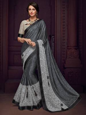 marvelously charming is what you will look at the next wedding gala wearing this beautiful Dark grey color Designer imported fabrics saree. Ideal for party, festive & social gatherings. this gorgeous saree featuring a beautiful mix of designs. Its attractive color and designer imported heavy embroidered design, flower design, stone design, beautiful floral design work over the attire & contrast hemline adds to the look. Comes along with a contrast unstitched blouse.