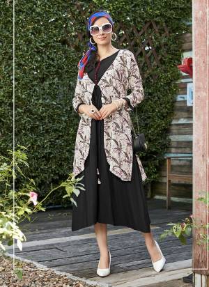 Add This Pretty Jacket Patterned Designer Readymade Kurti In Black And Cream Color Fabricated On Rayon. It Is Light Weight And Easy To Carry All Day Long.