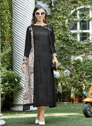 Grab This Pretty Double Layered Kurti In Black And Cream Color Fabricated On Rayon, This Kurti Will Definitely Earn You Lots Of Compliments From Onlookers. 